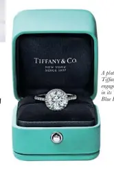  ?? ?? A platinum Tif fany Soleste engagement ring in its Tif fany Blue Box