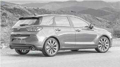  ??  ?? Though it looks similar to an Audi A3 Sportback, the new Elantra is a creature all its own.