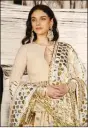  ??  ?? Aditi Rao Hydari in a design by Abu Jani and Sandeep Khosla.