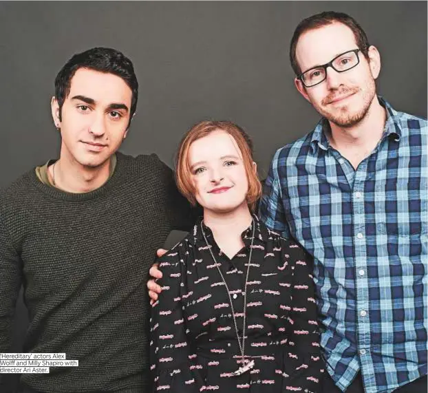  ??  ?? ‘Hereditary’ actors Alex Wolff and Milly Shapiro with director Ari Aster.
