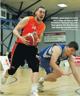  ?? PICTURE BY SPORTFILE ?? EFFORT: Jamie Hayes in action for EJ Sligo All-Stars in their President’s National Cup semifinal against UCC Blue Demons last Saturday evening in Cork.