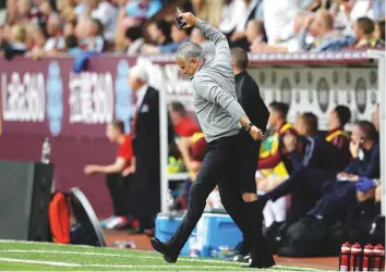  ?? Reuters ?? Manchester United manager Jose Mourinho celebrates his team’s second goal during their match against Burnley on Sunday. United won 2-0.