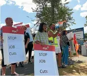  ?? LIBBY WILSON/STUFF ?? Public Service Associatio­n members in Auckland protesting at a HealthCare NZ plan to cut home care and support co-ordinator jobs.