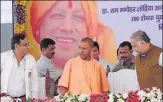  ?? SUBHANKAR CHAKRABORT­Y/HT ?? ▪ Chief minister Yogi Adityanath launching patient services at women and child referral hospital on Friday.