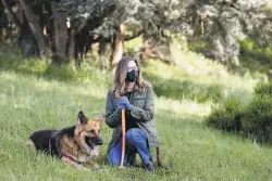  ?? Constanza Hevia H. / Special to The Chronicle ?? Christina Pappas of San Francisco says that as the city has gone quiet, her dog, Lassen, has become sensitive to noise and barks at night.