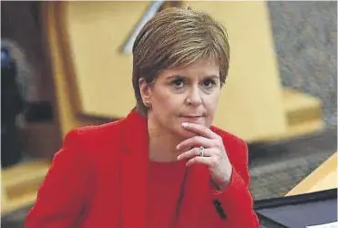  ?? ?? ↑ Nicola Sturgeon has bean accused of playing one set of workers against another