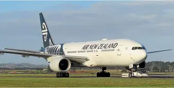 ??  ?? An Air New Zealand 777-200ER being towed from engineerin­g at Auckland.