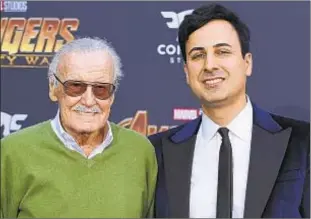  ?? INVISION/AP ?? The late Marvel mogul Stan Lee (left) and business manager Keya Morgan, who has now been charged with five counts of elder abuse.