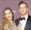  ?? Kevin Winter Getty Images ?? ACTORS Elizabeth Chambers and Armie Hammer