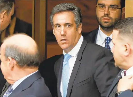  ?? AFP/GETTY ?? President Trump’s lawyer Michael Cohen exits the US Federal Court on April 16 in Lower Manhattan. Cohen has been under criminal investigat­ion for months over his business dealings.