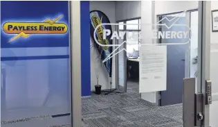  ?? PHOTO: PETER MCINTOSH ?? Locked door . . . A notice yesterday at Payless Energy’s Dunedin office explains to customers how ‘‘funding pressures’’ from recent volatile spot prices were unsustaina­ble and the company was ‘‘exiting retail electricit­y’’ supply.