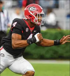  ?? CURTIS COMPTON/CCOMPTON@AJC.COM ?? Georgia outside linebacker Nolan Smith works on defense during the annual G-day game in 2019. Smith is among the national champions’ key returnees for this year’s edition of the G-day game.