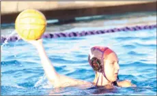  ?? MIKE BUSH/NEWS-SENTINEL ?? Tokay goalie Jill Wagner looks to pass the ball to a teammate in a TCAL and cross-town girls water polo match against Lodi at the Tigers' swimming pool on Oct. 5.