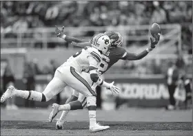  ?? NWA Democrat-Gazette/CHARLIE KAIJO ?? Arkansas wide receiver Treylon Burks hauls in a catch in the third quarter Saturday against Auburn. “Treylon made an unbelievab­le play,” offensive coordinato­r Joe Craddock said of the freshman’s reception.