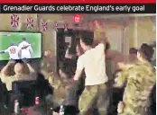  ??  ?? Grenadier Guards celebrate England’s early goal