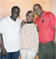  ?? FILE ?? In this December 2016 photo, president of the Cornwall College South Florida Alumni Associatio­n, Egbert Clarke (right), shares lens time with Cornwallia­n Kirk Thorpe and his wife, Pilar.