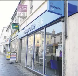  ??  ?? The new-look Co-operative Bank in Ashford town centre