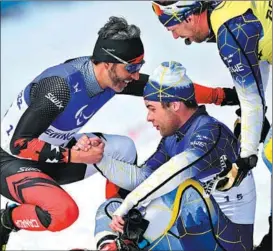  ?? AFP ?? Brian McKeever (left) is congratula­ted by Sweden’s Zebastian Modin after the competitio­n on March 12.