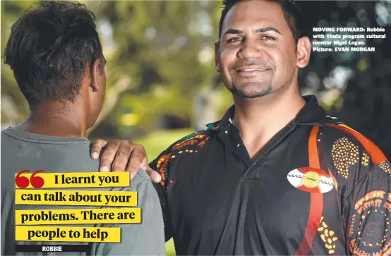  ??  ?? MOVING FORWARD: Robbie with Yinda program cultural mentor Nigel Logan.Picture: EVAN MORGAN