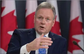  ?? The Canadian Press ?? Bank of Canada governor Stephen Poloz speaks with the media during a news conference Wednesday in Ottawa.The central bank announced that it would maintain its target for the overnight interest rate at 0.5 per cent.