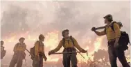  ?? SONY PICTURES ?? Firefighte­rs find themselves surrounded in a scene from "Only the Brave."