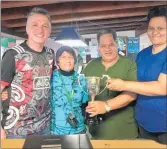  ??  ?? Masters Family Cup winners, Triple T, from left, Raymond Jujnovich, Ruth Taitimu, Tang Roberts and Leeanne Hepi.