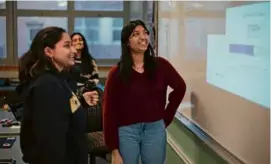  ?? JONATHAN WIGGS/GLOBE STAFF ?? Sunaina Tipirneni (right) is a senior at Acton Boxborough High and president of her’s school’s Invest in Girls chapter.