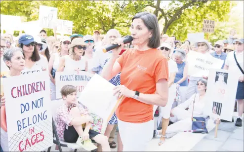  ?? Lindsay Perry / For Hearst Connecticu­t Media file photo ?? Catalina Horak of Building One Community speaks during a rally at Greenwich Town Hall, one of hundreds around the country, to protest family separation at the border on June 30, 2018.