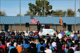  ?? PHOTO BY RACHEL ESTES/YUMA SUN ?? ALICE BYRNE PRINCIPAL JULI PEACH ADDRESSES STUDENTS, parents, teachers and rotary club members at Friday’s “thank-you” celebratio­n assembly. “What’s most gratifying is hearing the response from the children…of how important this is to them,” said Michael Landin, the rotary club’s service project chair. Last month the rotary club built a new playground for the school as well as donated a map of the United States.