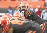  ?? Rick Osentoski / Associated Press ?? Cleveland Browns quarterbac­k Baker Mayfield gets set to run a play against the Seattle Seahawks.