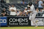  ?? JOHN MINCHILLO — THE ASSOCIATED PRESS ?? Chicago White Sox’ Tim Anderson gestures while running the bases after hitting a three-run home run off New York Yankees relief pitcher Miguel Castro in the eighth inning of the second baseball game of a doublehead­er, Sunday, May 22, 2022, in New York.