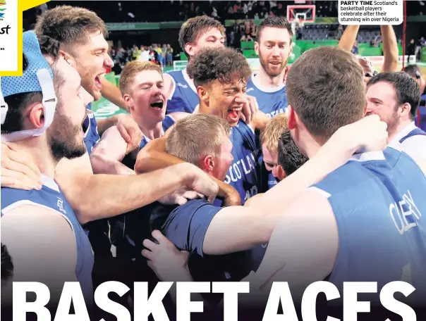  ??  ?? PARTY TIME Scotland’s basketball players celebrate after their stunning win over Nigeria