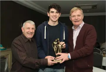  ??  ?? Young player of the year Darragh Noone receiving his award from Seamus Buckley and Lenny Lennox.