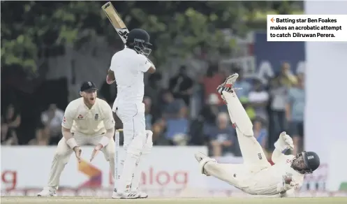  ??  ?? Batting star Ben Foakes makes an acrobatic attempt to catch Dilruwan Perera.