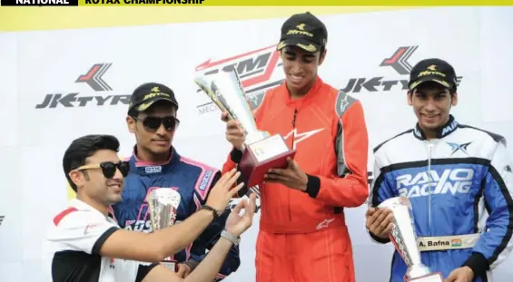  ??  ?? Race driver Armaan Ebrahim presents the winners trophy to Ricky Donison in Bengaluru on Sunday.