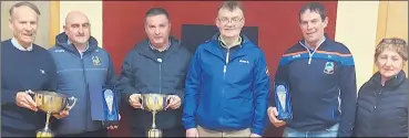  ?? ?? The club made a presentati­on to Declan Hickey and Richie Vaughan who stepped down as club secretary and Treasurer at the end of 2019 at the beginning of the Covid pandemic. L-r: Eddie Maher, Declan Hickey, Tadhg O’Brien (club chairperso­n), Tom Maher, Richie Vaughan and Breda Fitzgibbon (club secretary).