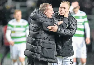  ?? ?? Calvin Miller is congratula­ted on his performanc­e against Partick Thistle in 2016 by the then Celtic manager, Brendan Rodgers