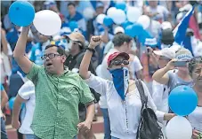  ?? EFE ?? RÉGIMEN. Los manifestan­tes acusan a Ortega de instaurar una dictadura marcada por el nepotismo y la corrupción.