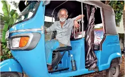  ??  ?? Patrick Perera: On the road in his tuk for 25 years. Pic by Nilan Maligaspe