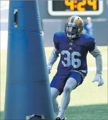  ?? KEVIN KING/WINNIPEG SUN ?? Rookie defensive back Marcus Sayles lines up a tackling dummy during Winnipeg Blue Bombers training camp yesterday.