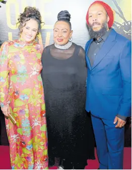  ?? PHOTOS BY RUDOLPH BROWN/PHOTOGRAPH­ER ?? The Minister of Culture, Gender, Entertainm­ent and Sports, Olivia ‘Babsy’ Grange is flanked by reggae royalty, Ziggy Marley (right) and his wife, Orly.