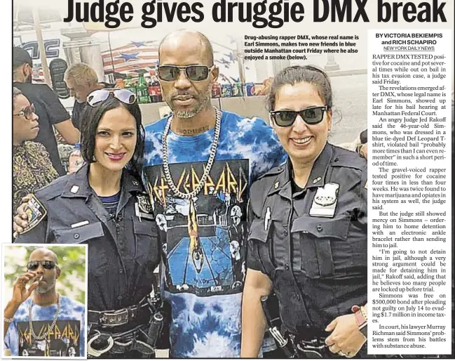  ??  ?? Drug-abusing rapper DMX, whose real name is Earl Simmons, makes two new friends in blue outside Manhattan court Friday where he also enjoyed a smoke (below).