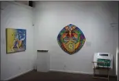  ??  ?? The work of Gary Graham and Susan Kelk Cervantes is displayed Tuesday. Graham and Cervantes are two of 10 featured artists in the Visionary Art Legacy show at the Chico Art Center in Chico.