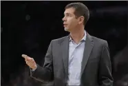  ?? DARREN ABATE - THE ASSOCIATED PRESS ?? Boston Celtics head coach Brad Stevens signals to his players during the first half of an NBA basketball game against the San Antonio Spurs, Saturday, Nov. 9, 2019, in San Antonio.