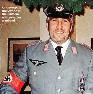  ??  ?? So sorry: Paul Hollywood in the uniform with swastika armband