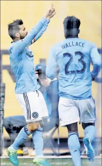  ?? AP ?? DAVID A GOAL-IATH: NYCFC captain David Villa, who scored the game’s first goal and his sixth this season, celebrates with Rodney Wallace during a 3-1 win over Atlanta on Sunday.