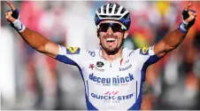 ?? — AFP photo ?? Alaphilipp­e celebrates as he crosses the finish line to win the 2nd stage of the 107th edition of the Tour de France cycling race, 187 km between Nice and Nice.