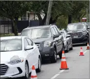  ?? DAVID J. PHILLIP — THE ASSOCIATED PRESS ?? People wait in line during a baby formula drive to help with the baby formula shortage Saturday in Houston.