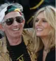  ?? BERNARD WEIL/TORONOT STAR ?? Rolling Stones guitarist Keith Richards and his wife, Patti Hensen, walk the TIFF red carpet Thursday night.