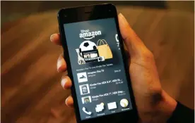  ??  ?? NEW YORK: This June 18, 2014, file photo shows the app that links to shopping on Amazon.com on the new Amazon Fire Phone, in Seattle. — AP